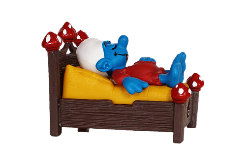 a happy back sleeping smurf on the right mattress for a back sleeper